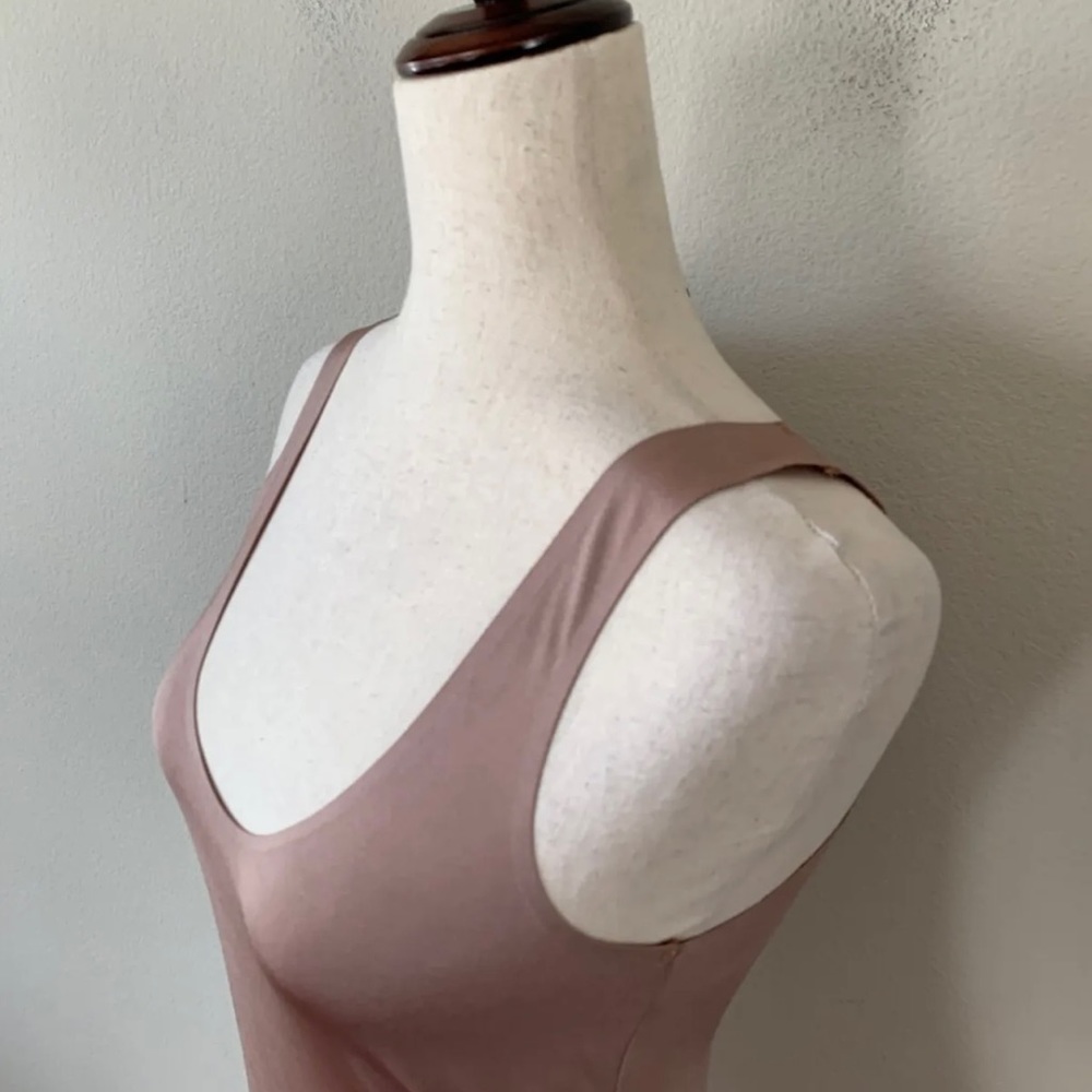 Beautiful, soft, sexy nude/cream colored Inc body suit. Size Large NWT